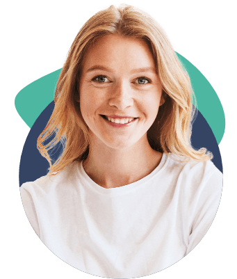 Smiling woman with light hair wearing a white shirt.